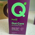 PurQ Gut Care supplement box in purple and green packaging, containing Queen Garnet Powder with Pre + Probiotic, 15 sachets of 10g each