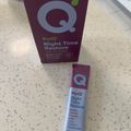PurQ Night Time Restore supplement box and individual packet containing Queen Garnet Powder with Sour Cherry and Chamomile on a speckled countertop