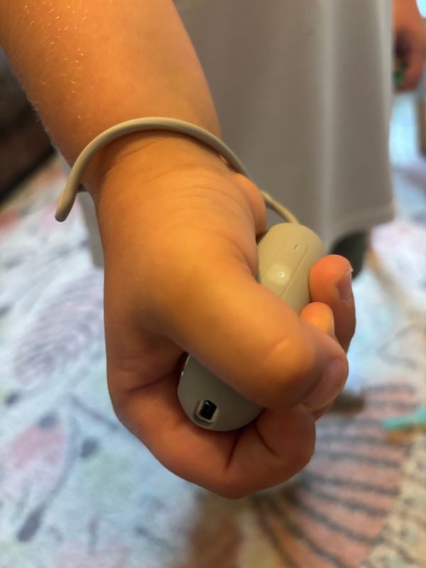 Reference product held in a hand