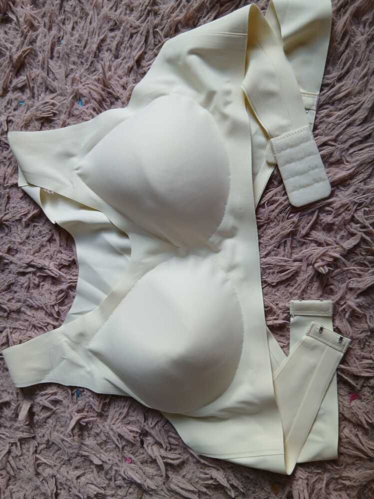 White undergarment on textured fabric surface