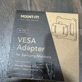 MOUNT-IT! VESA Adapter product package for Samsung monitors, model MI-794, showing compatibility with Samsung Odyssey Neo G9, CRG9, CHG9, and CHG90 monitors