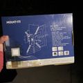 Product box for Mount-It MI-4152 low-profile swivel TV wall mount with technical specifications and diagrams on blue packaging