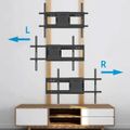 Wall-mounted TV bracket system with three adjustable mounting arms labeled L and R, positioned above a wooden media console with white drawers