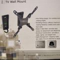 Product packaging for Mount-It aluminum pivot TV wall mount showing black mounting hardware and specifications including 43-inch/109cm maximum size and 15kg/33lbs weight capacity