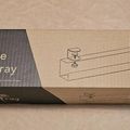 Package box for a Mount-It clamp-on cable management tray with product illustration on cardboard packaging