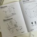 Assembly instruction manual showing steps 3-5 for mounting equipment, with diagrams illustrating how to attach feet and connect power lines to a device