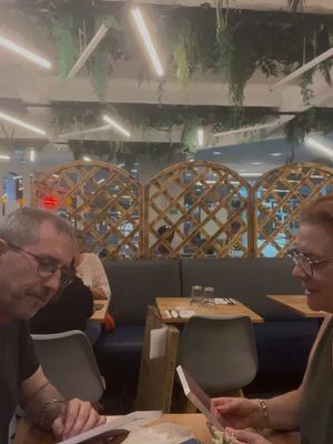 Two people at a restaurant