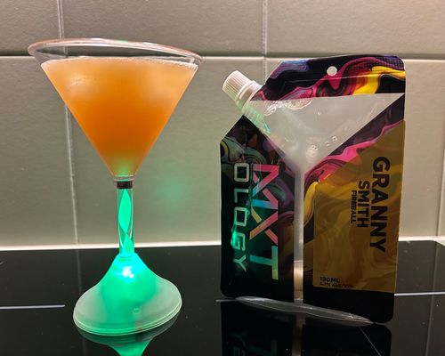 Customer photo from Karla's review: Granny Smith Fireball in a cocktail glass