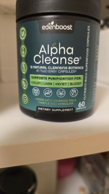 Customer-uploaded image. Click to see more details. The image represents: A bottle of Edenboost Alpha Cleanse dietary supplement containing 60 capsules. The dark container features a teal label with white text describing it as a natural cleansing botanical supplement that supports purification for colon, liver, kidney, and blood. The label indicates it contains organic milk thistle and spirulina.