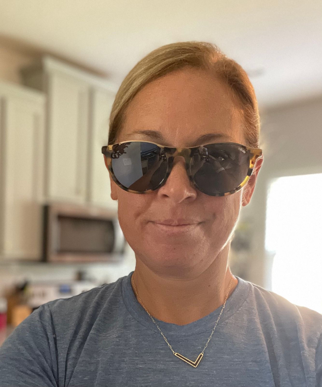 Revo Nolita Sunglasses Amber Horn Frame Champagne Lenses