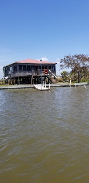 Michael R.'s fishing camp on stilts over the water