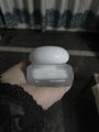 Hand holding a white jar of Hydrating Barrier Cream by OOO parable, 50ml size, in what appears to be a bathroom setting
