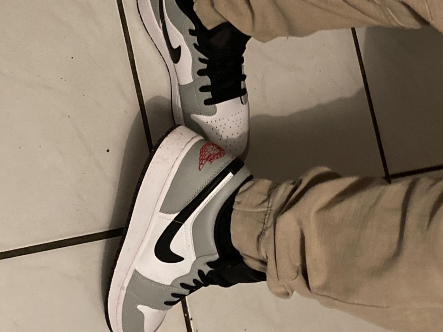on feet neutral gray air jordan