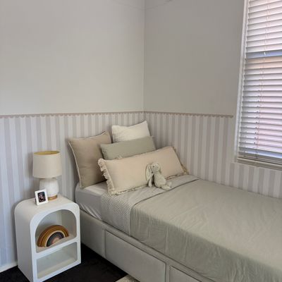 Striped scalloped border panels in bedroom