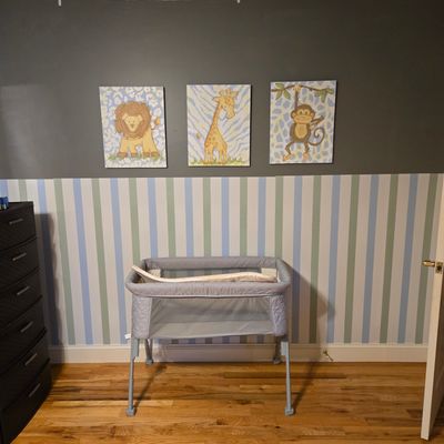 Mixed stripes wall panels in nursery