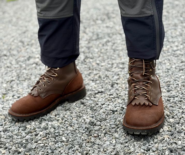 Brown O.T. Pro boots on gravel