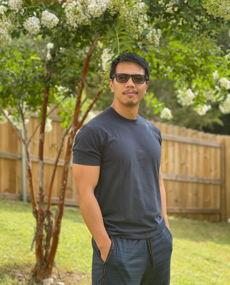 Customer wearing a dark True Classic crew outdoors