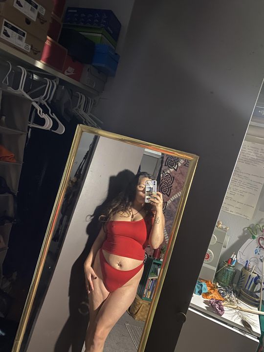 Alissa wearing a red Moana High Waist G-String in a mirror selfie