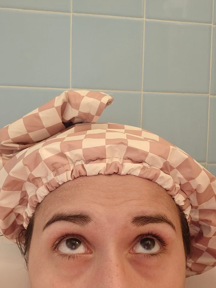 plastic bag sleeping with shower cap