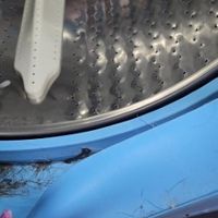 Customer-uploaded image. Click to see more details. The image represents: Interior of a boat hull showing metal surface with rivets and blue painted exterior edge