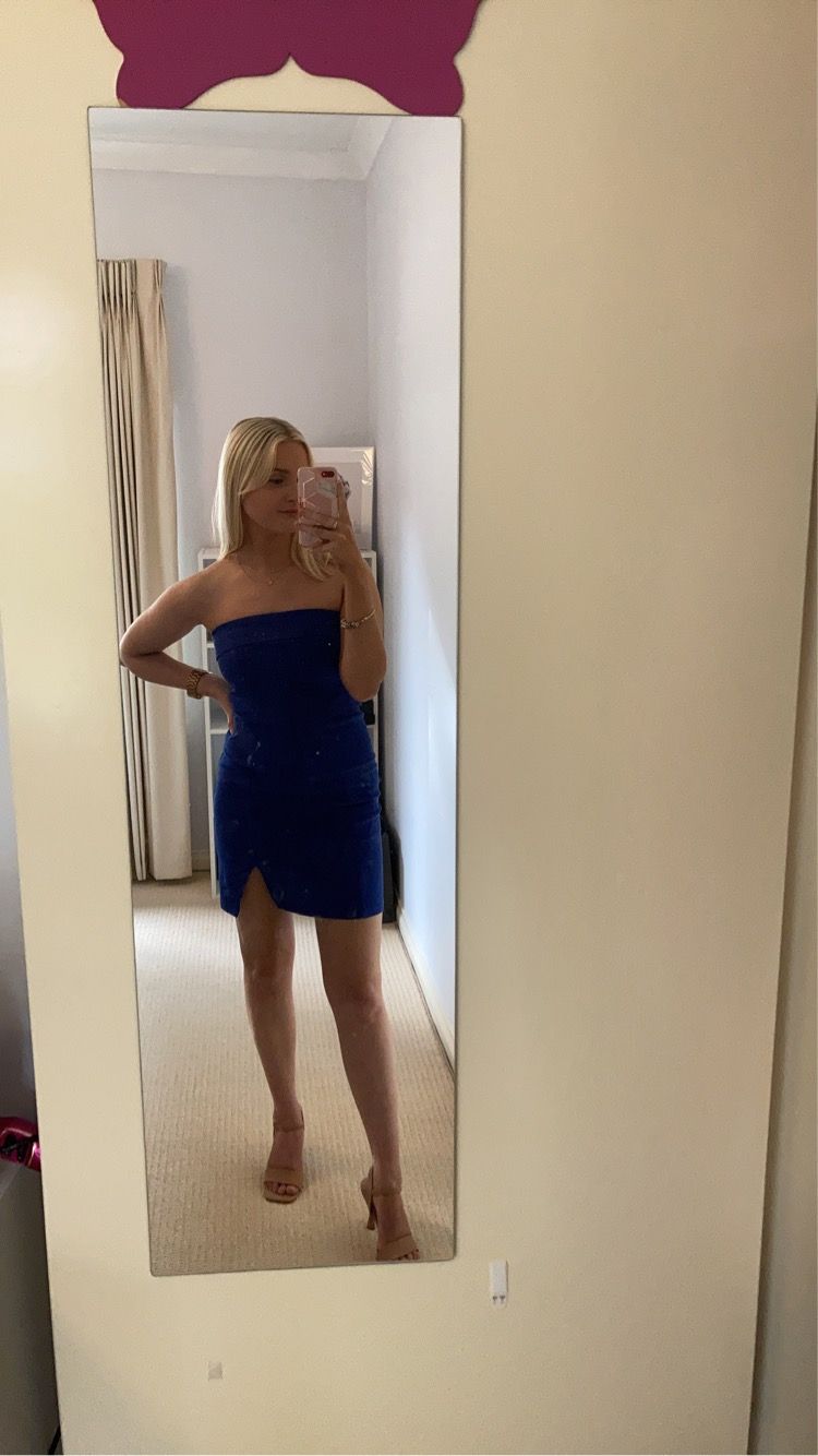 tere mini dress in bright cobalt Kiana Crafted from stretchy bandage fabric Costa Cobalt Check Puff Sleeve